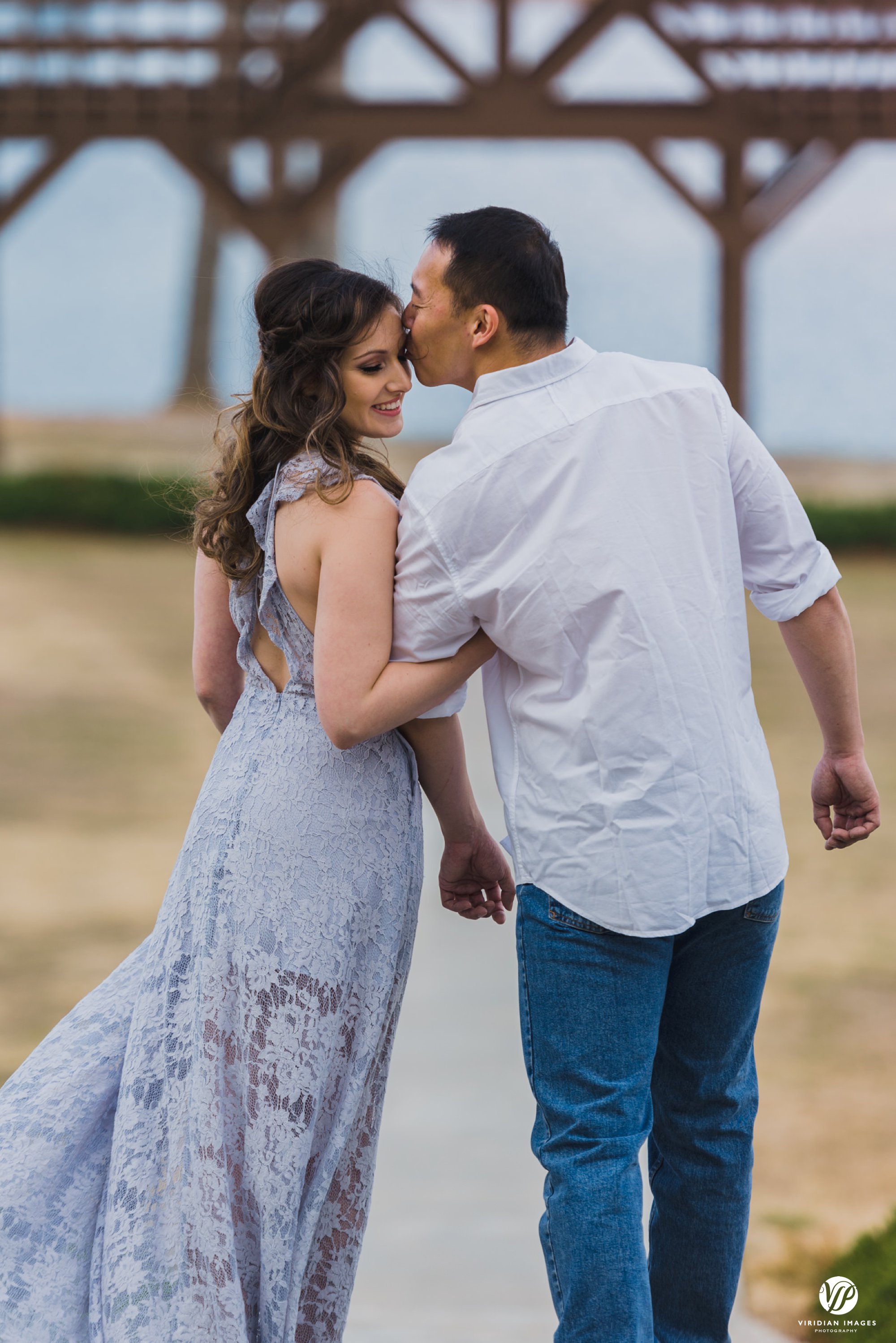 pineisle romantic groom kissing bride