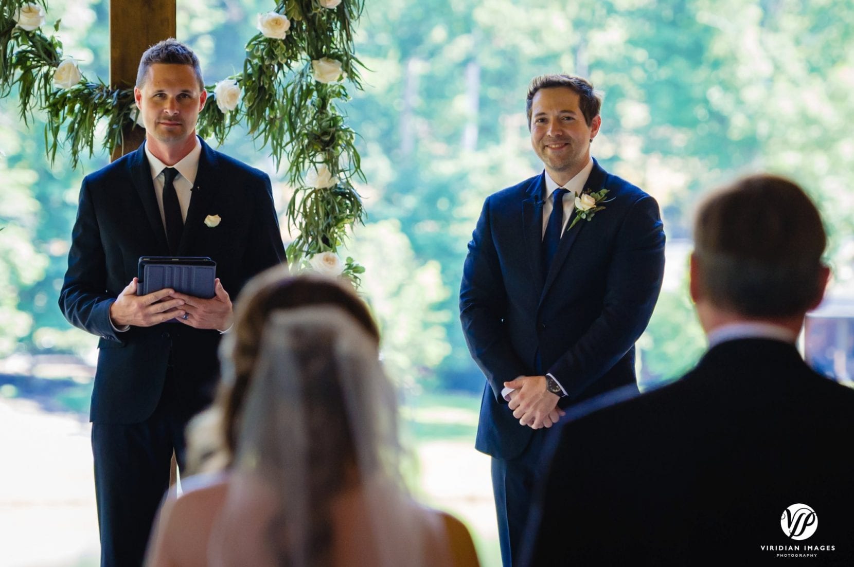 groom sees bride down aisle