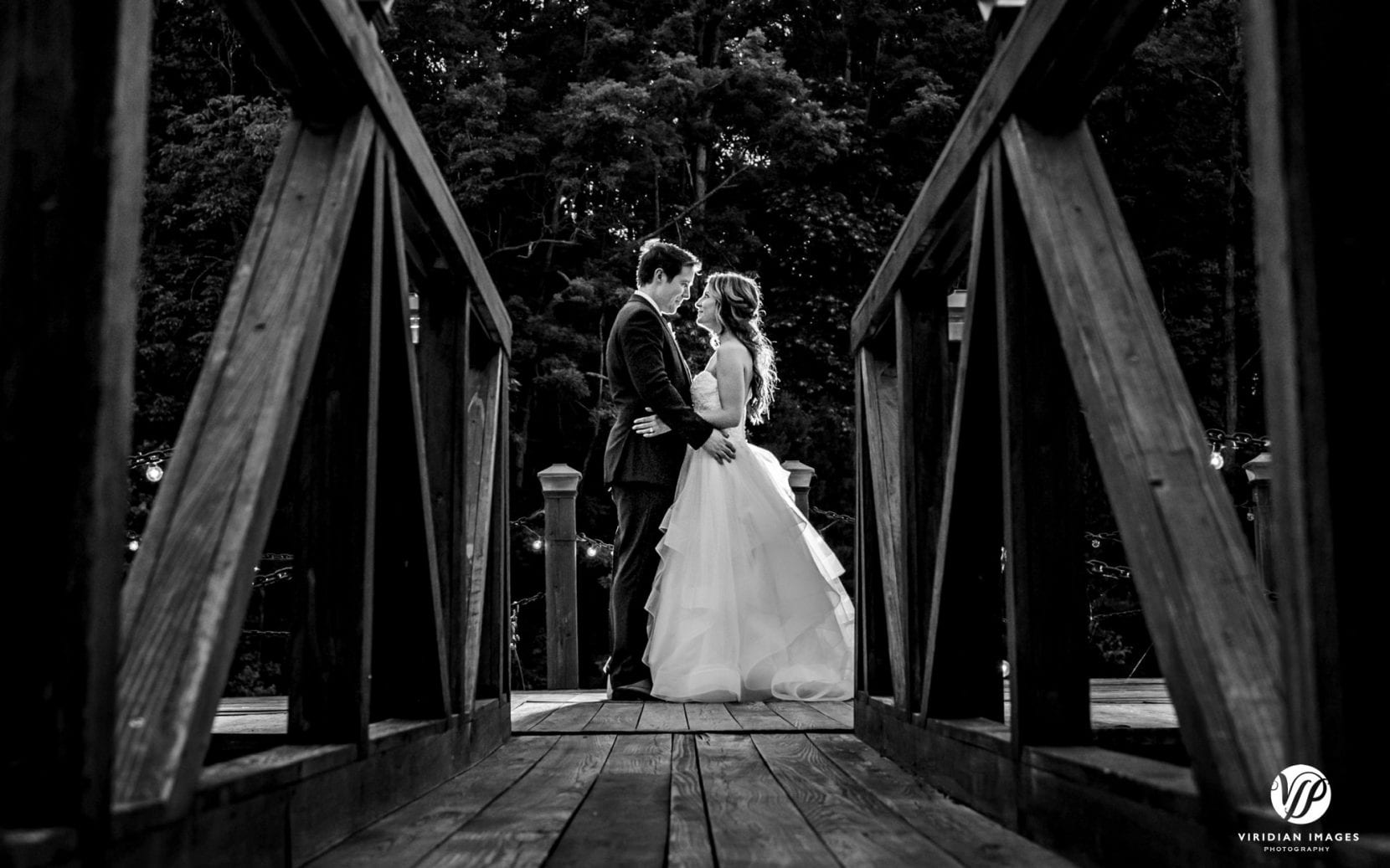 dusk photos with bride and groom on dock