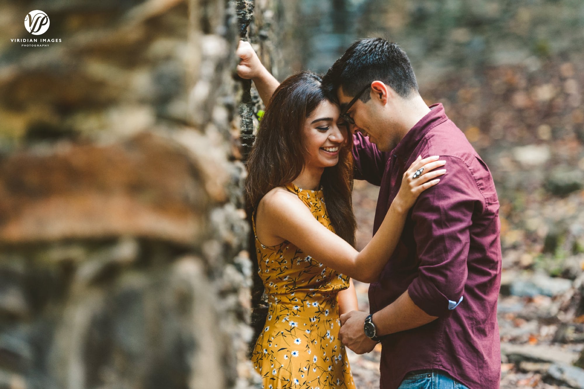 playful couple facing each other