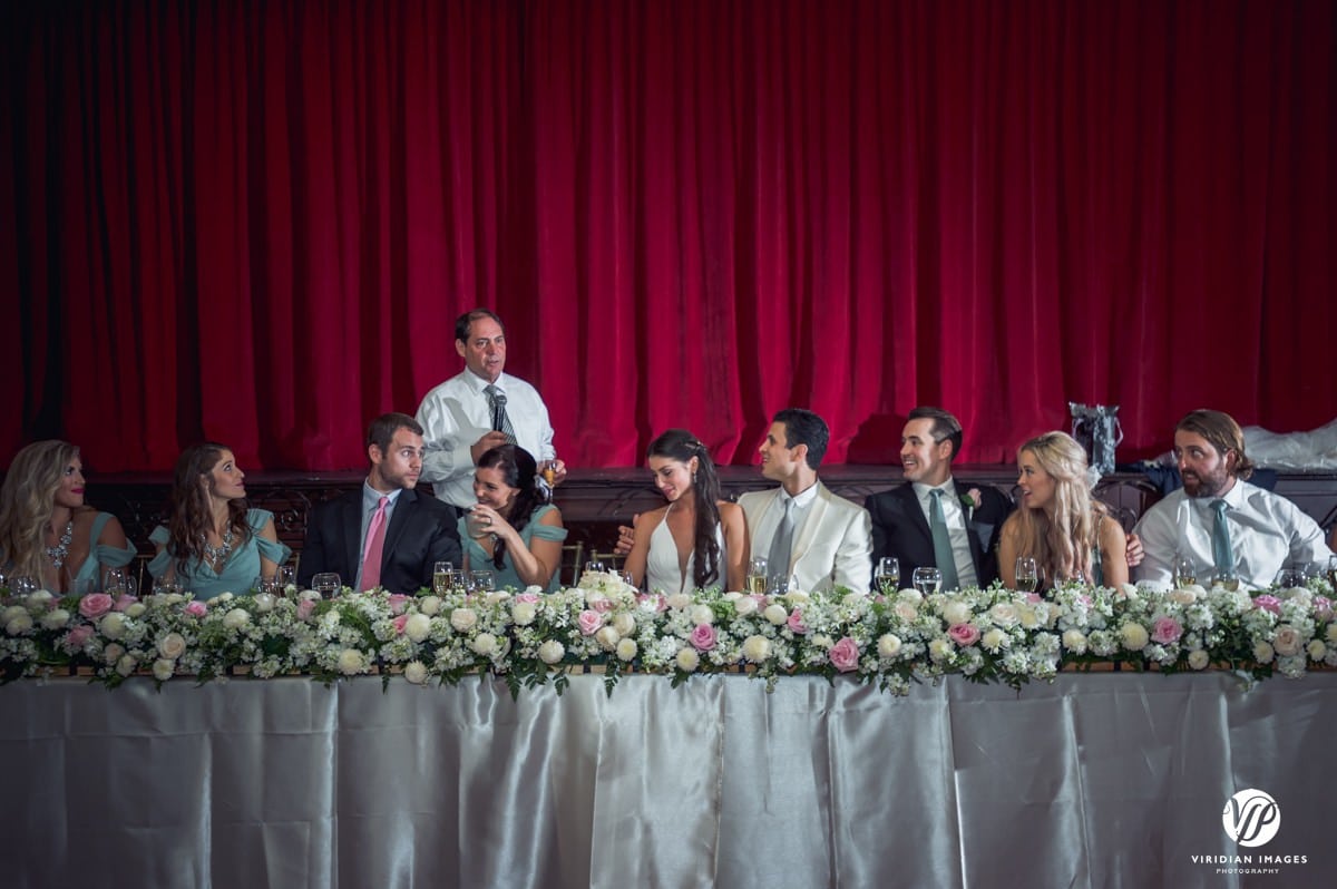 secrets capri father toasting head table