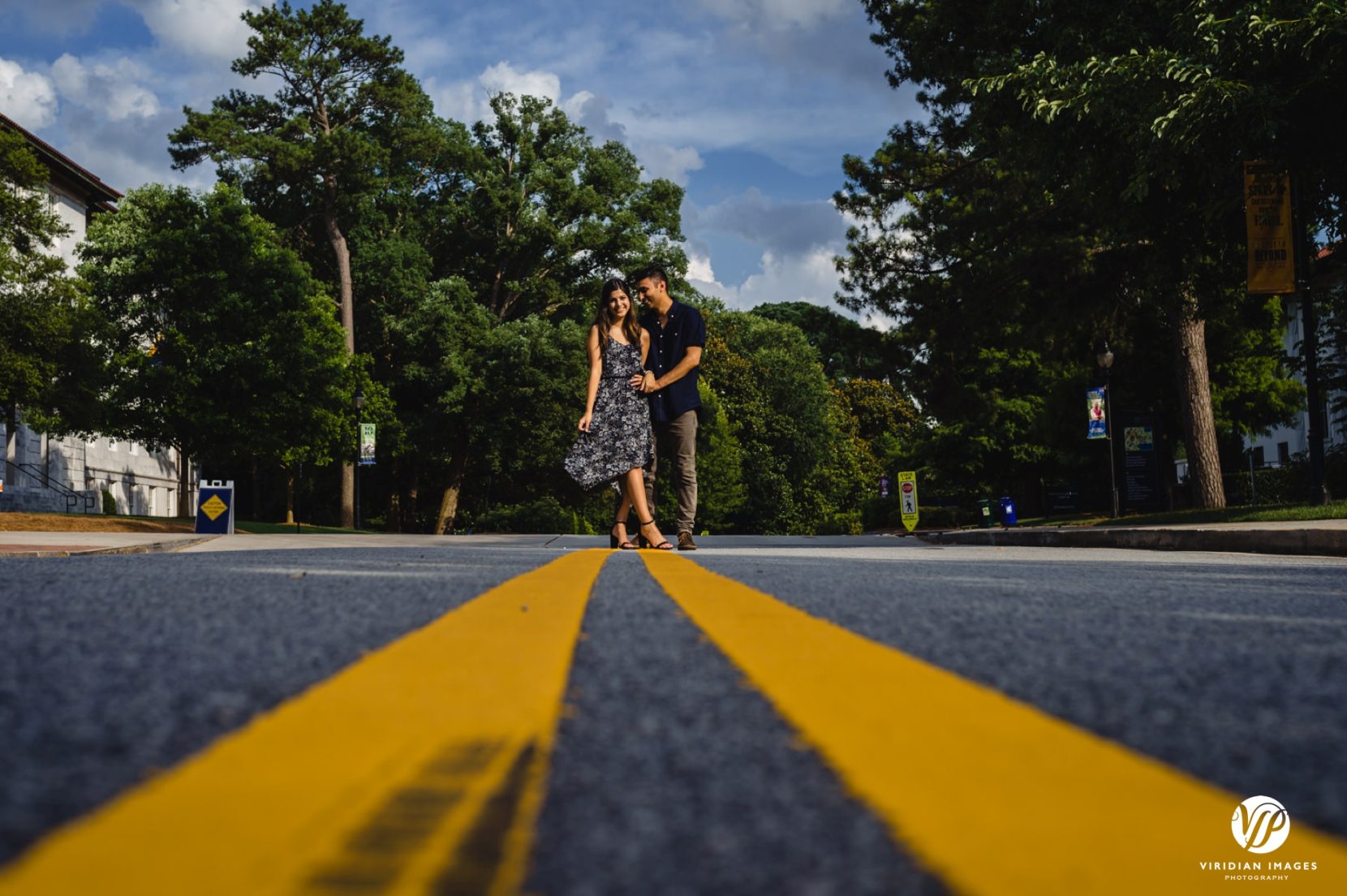 couple meet middle of street yellow stripe