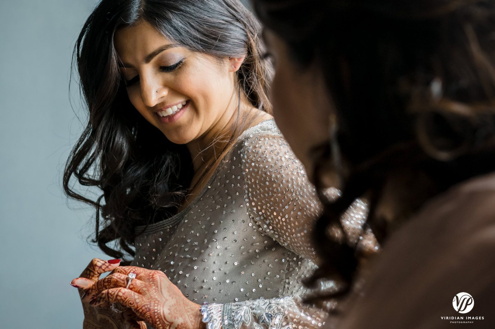 bride putting on rings