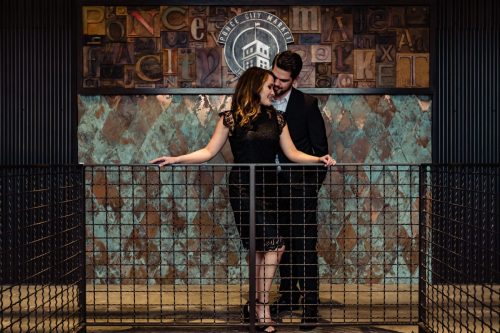 romantic couple against stairwell