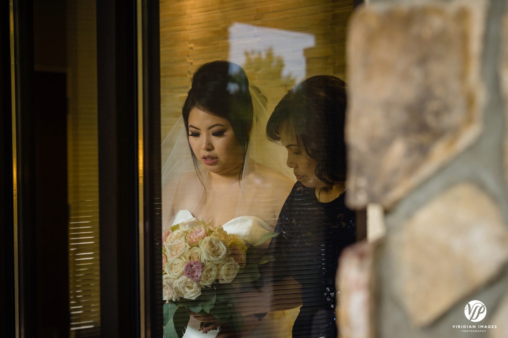 bride and mom preparing for processional