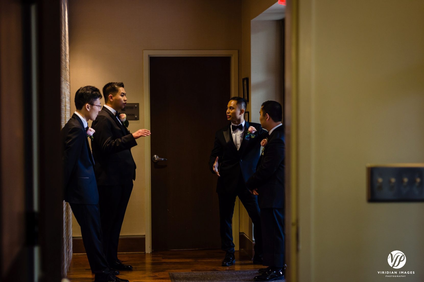 groom and groomsmen getting ready