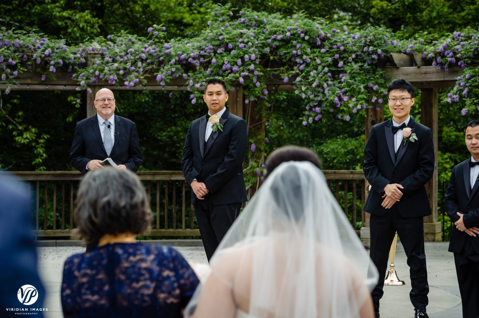 groom emotional seeing bride down aisle