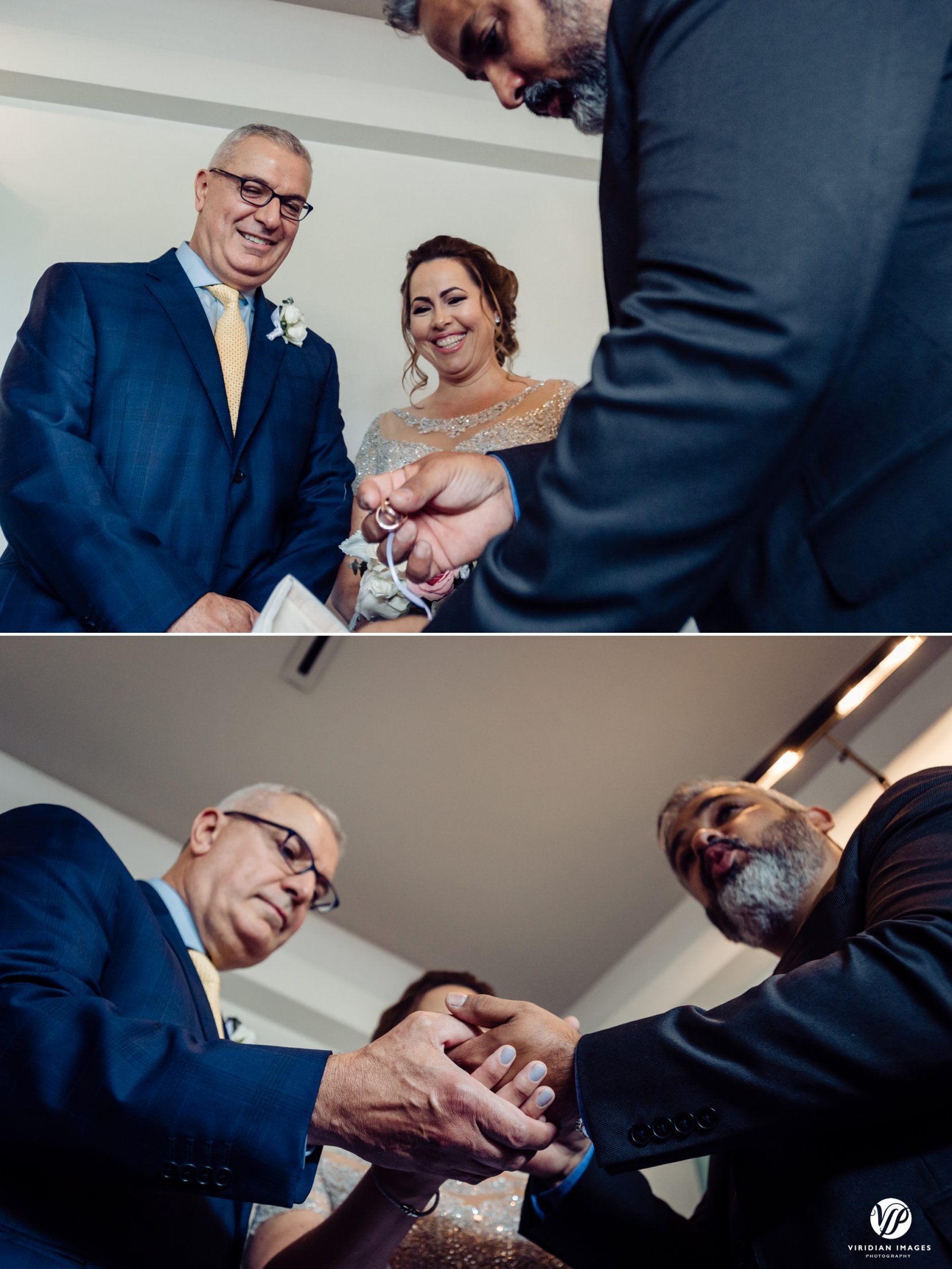 bride and groom watching officiant hold wedding rings