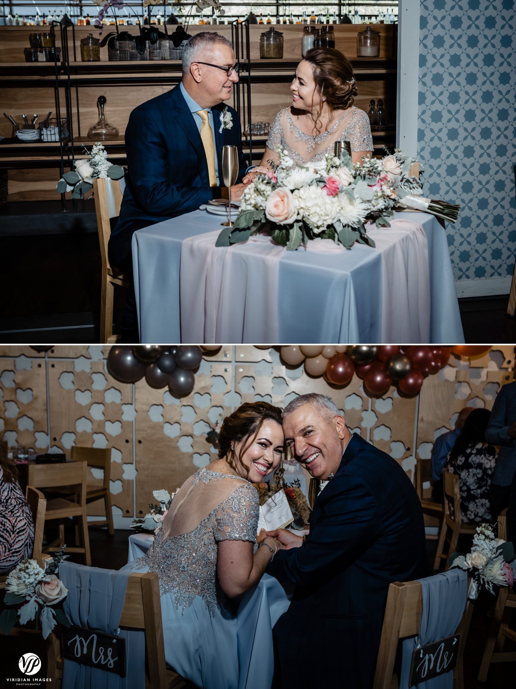 bride and groom sitting at sweetheart table