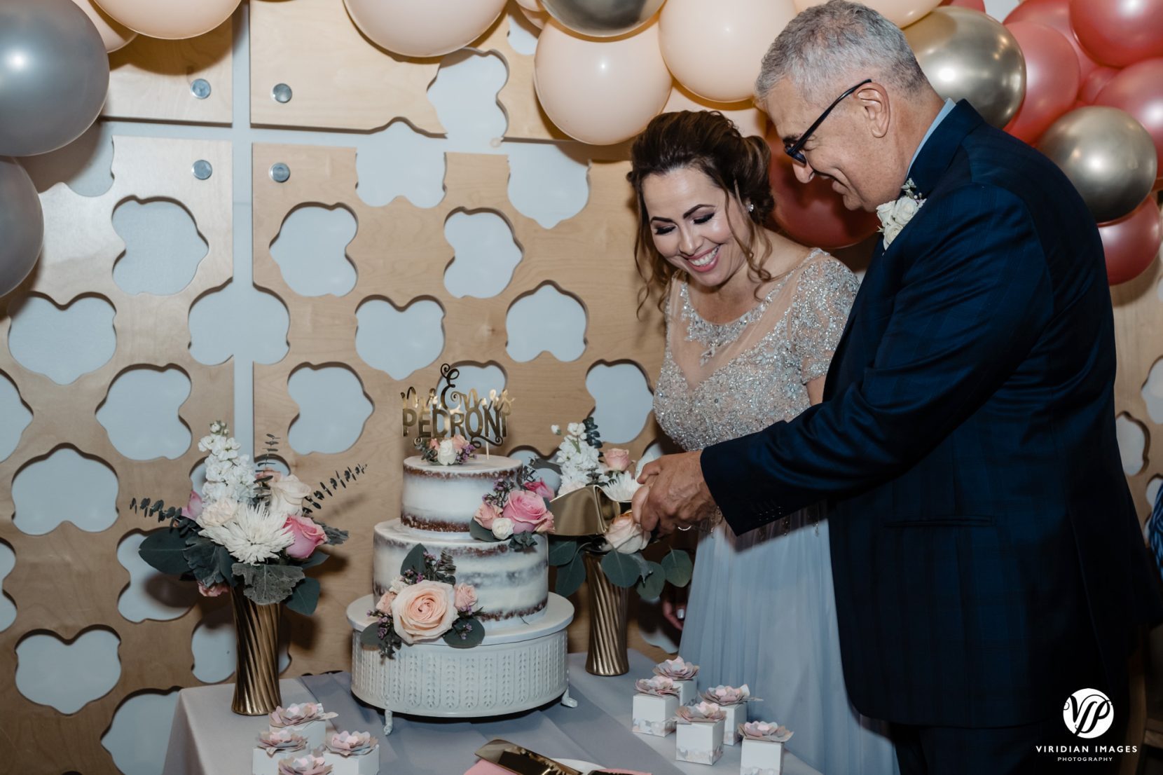 wedding cake cutting bride and groom