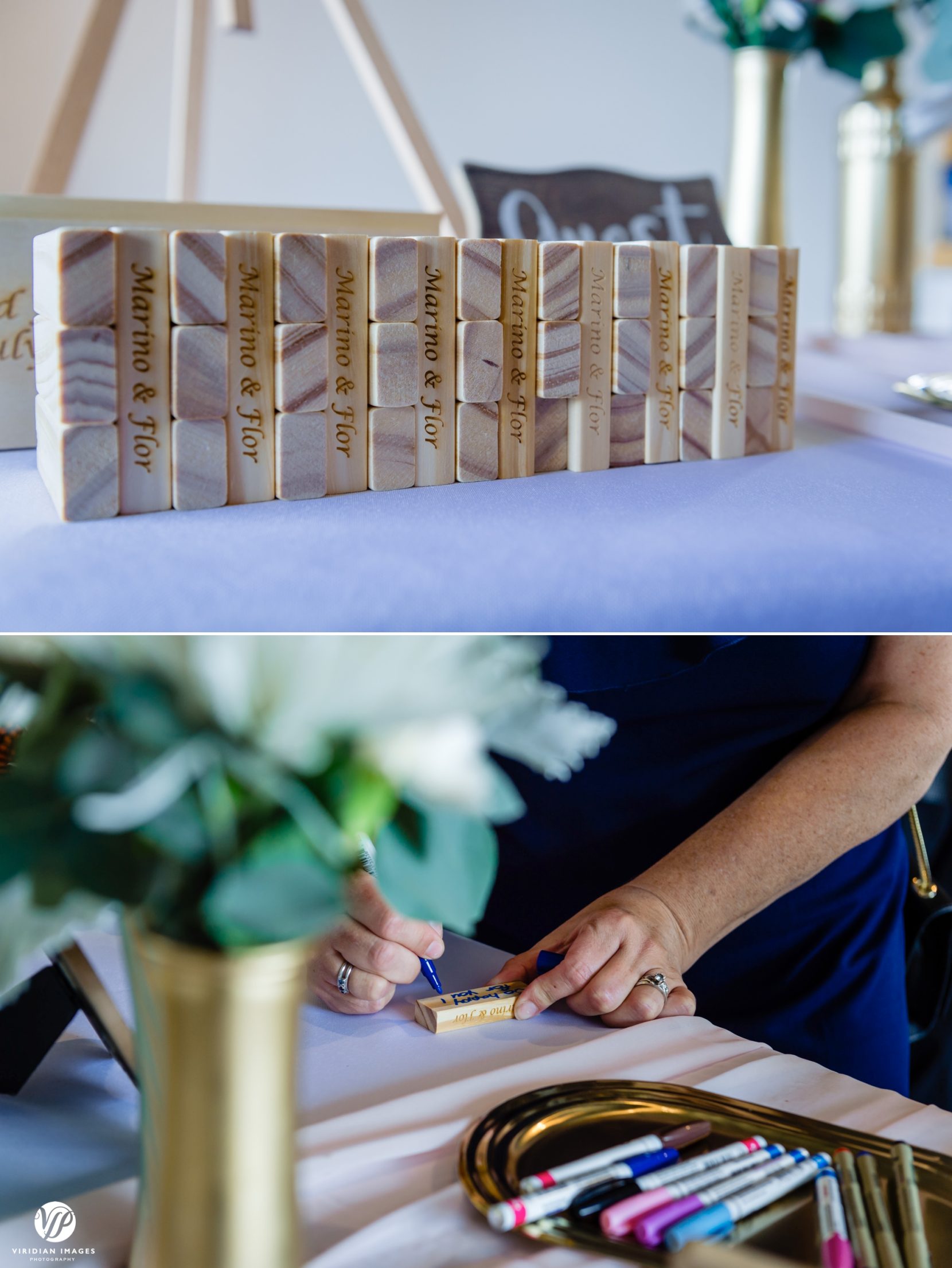 guest signing jenga blocks engraved with bride and groom's names