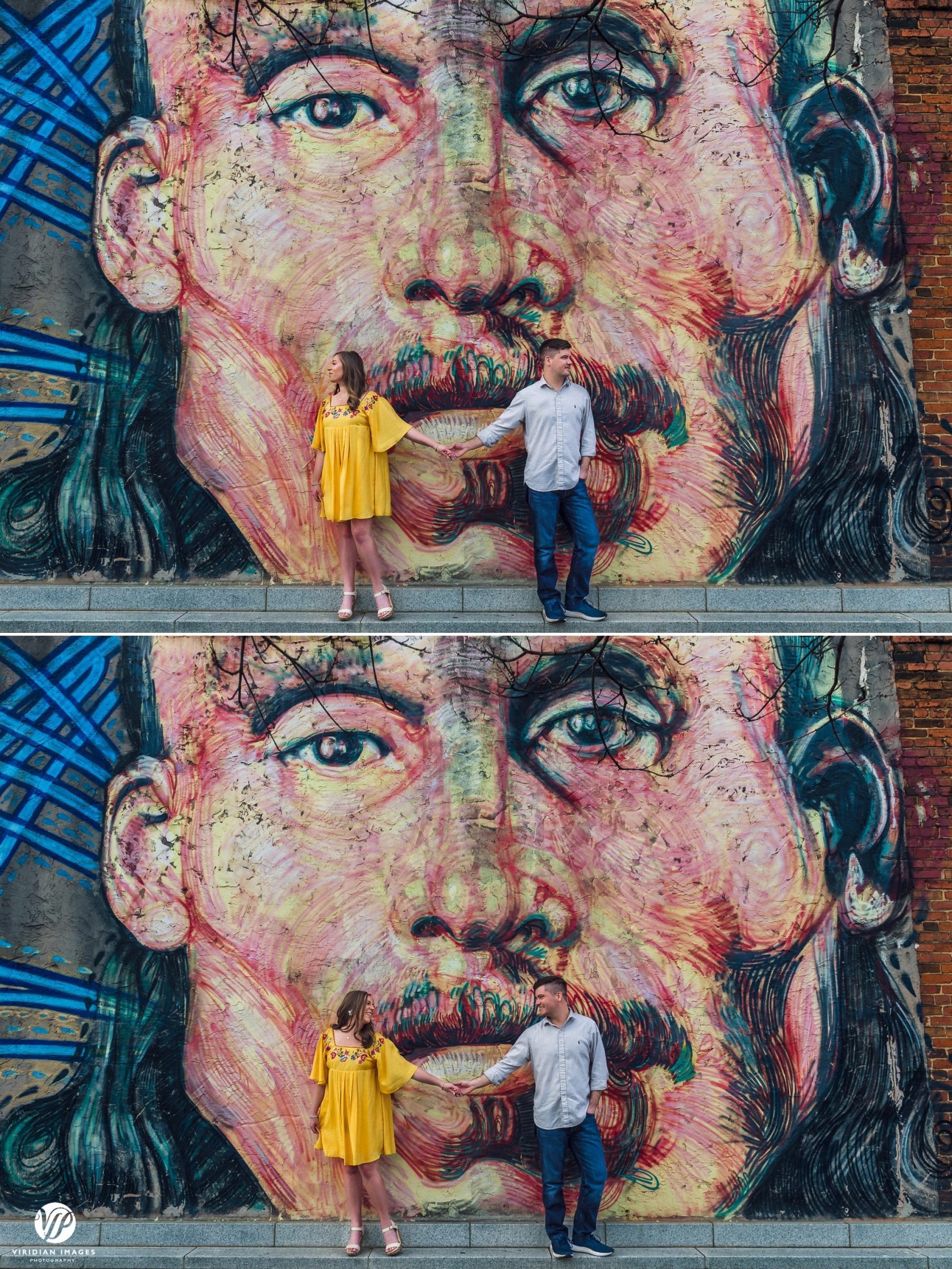 wide shot of couple against mural of man
