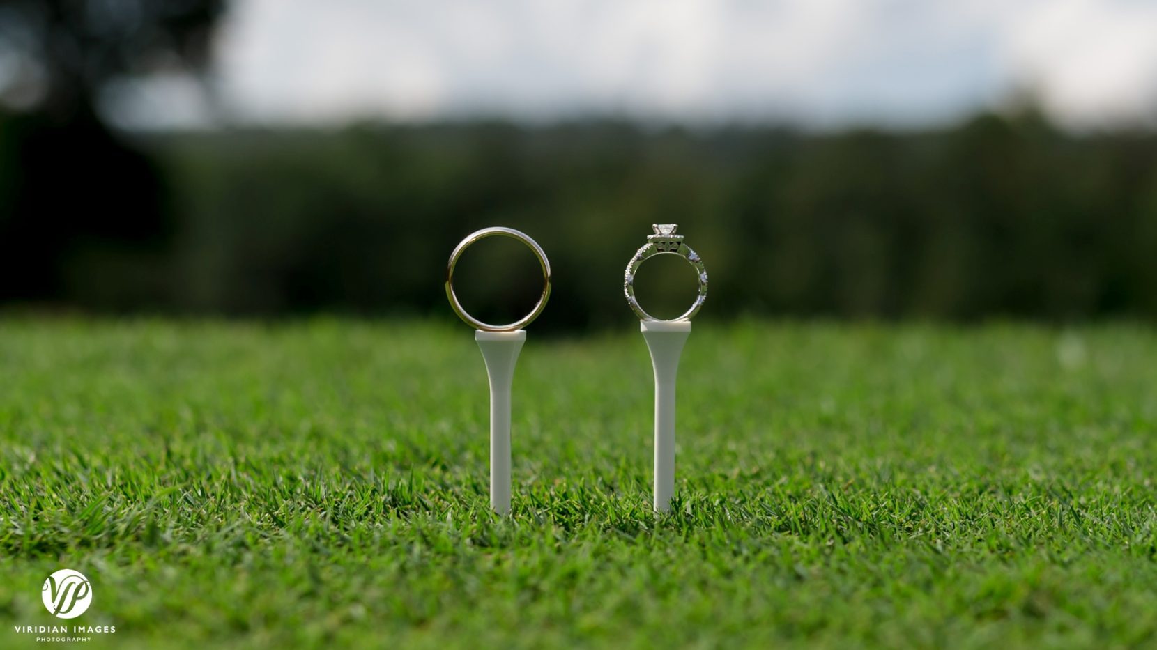 wedding rings on golf tee