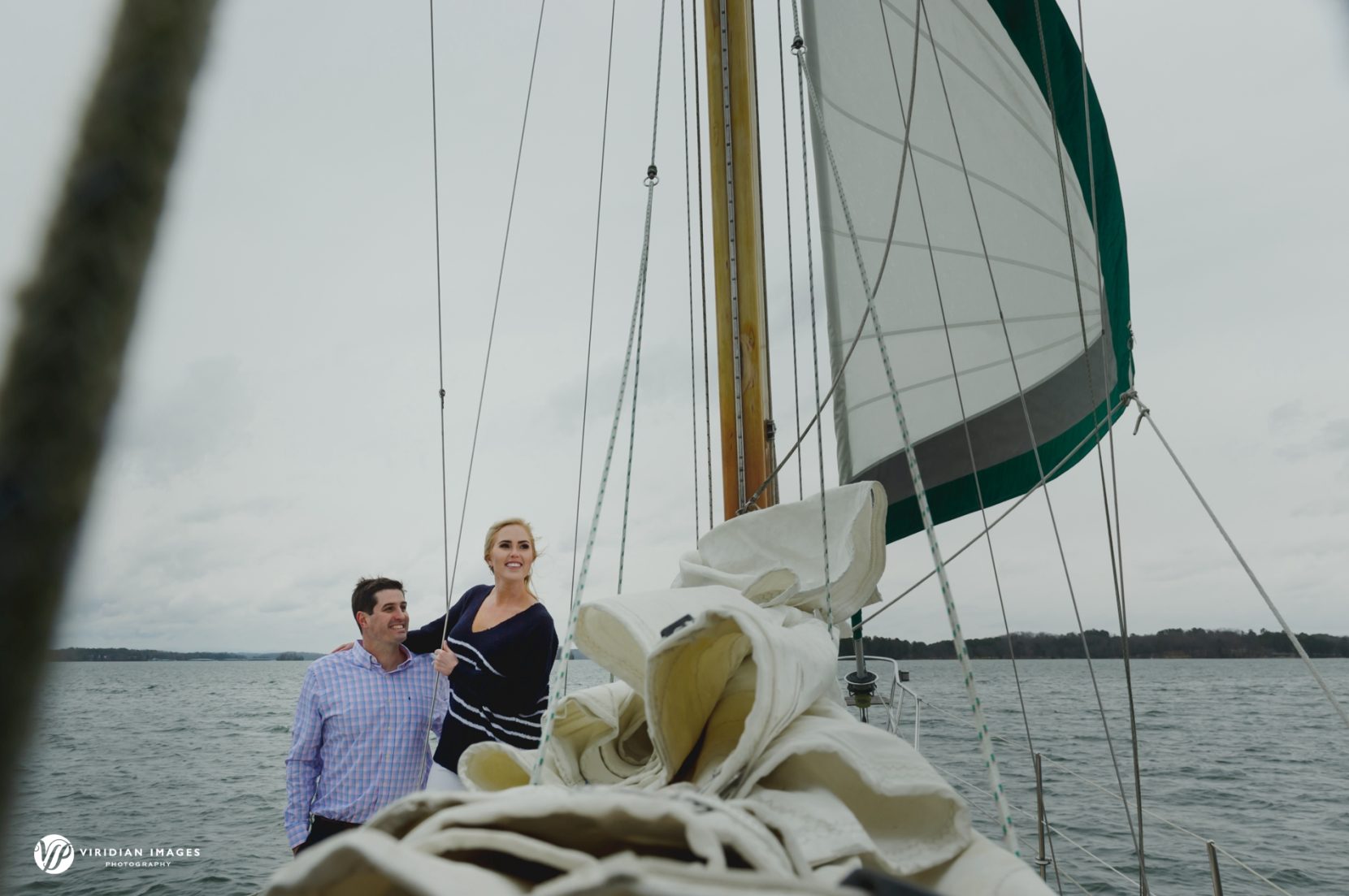 Couple sailing during winter engagement session in north Georgia