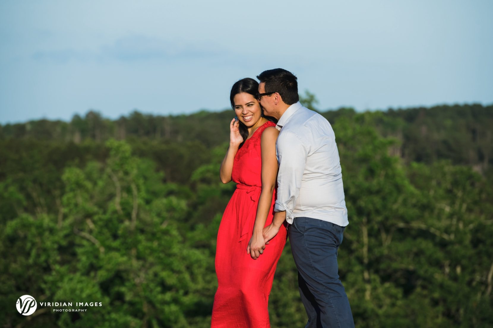 Engaged couple hugging on top of Arabia mountain photoshoot