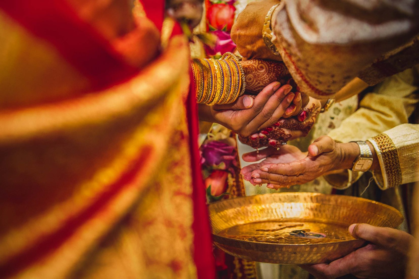 southeast asian wedding ceremony of washing hands