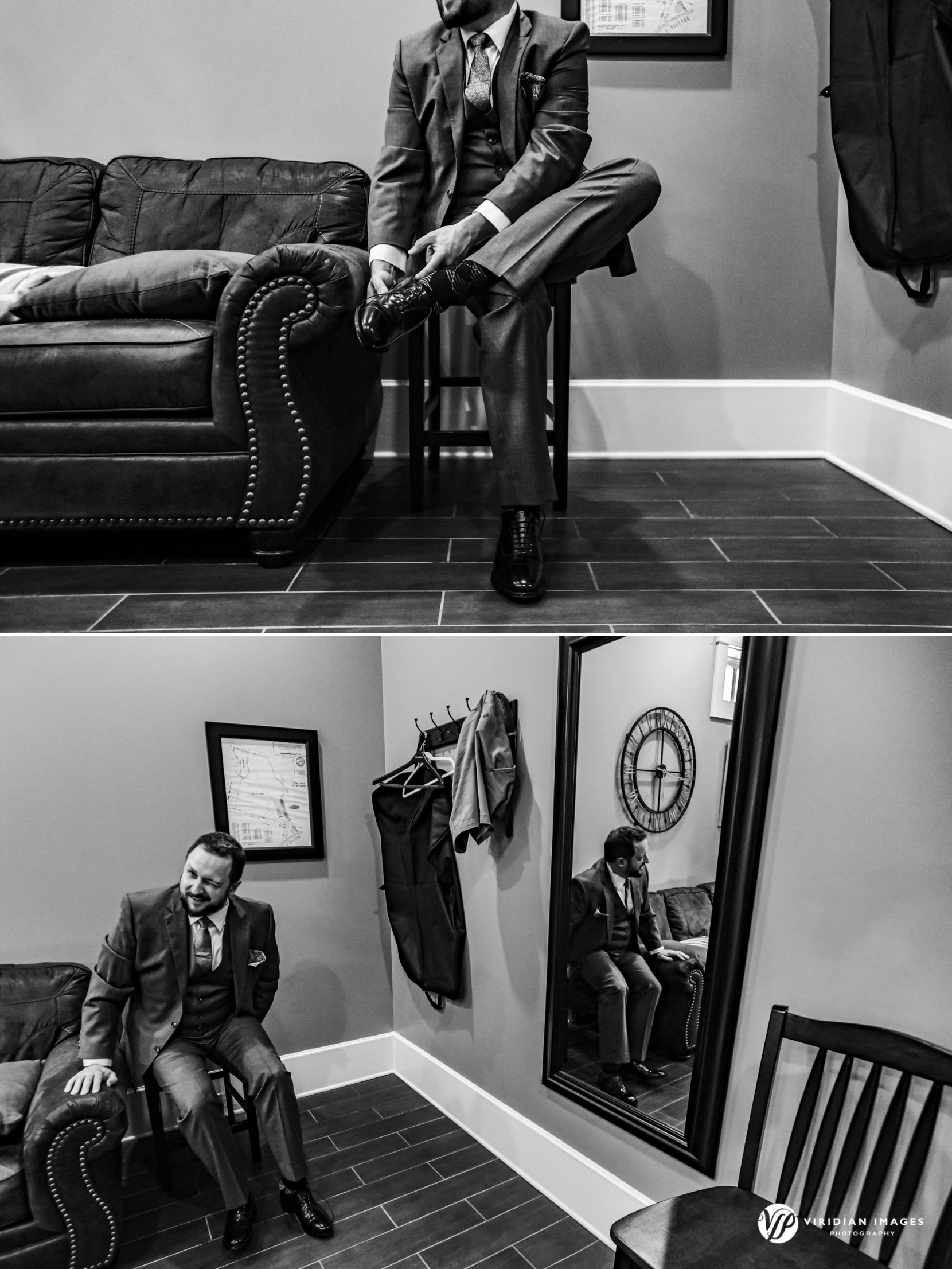 Groom squeezing into dress shoes on wedding day