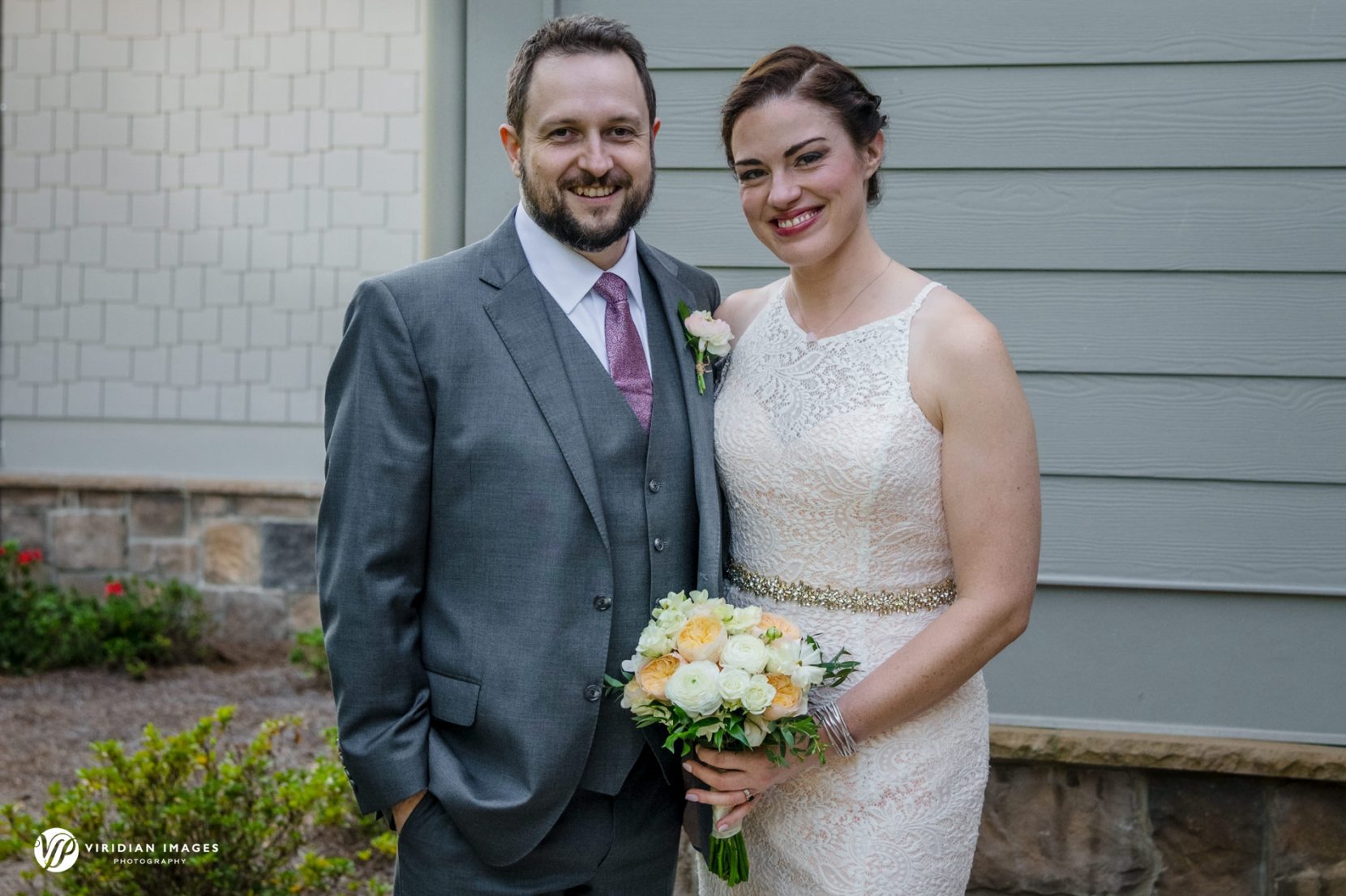 Bride and Groom pose for traditional portrait after first look