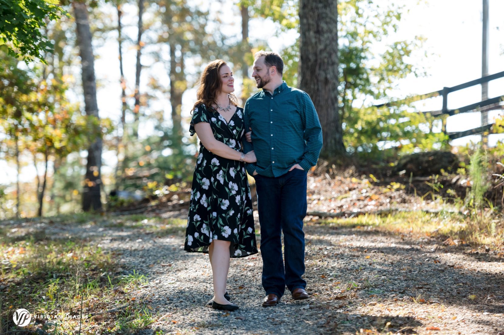 Couple walking arm in arm along trail at The Cottage Vineyard and Winery
