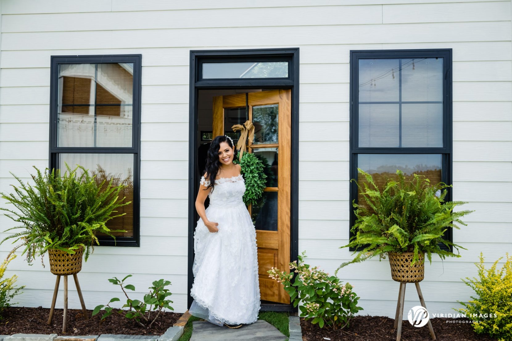 Bride exiting bridal suite for first look