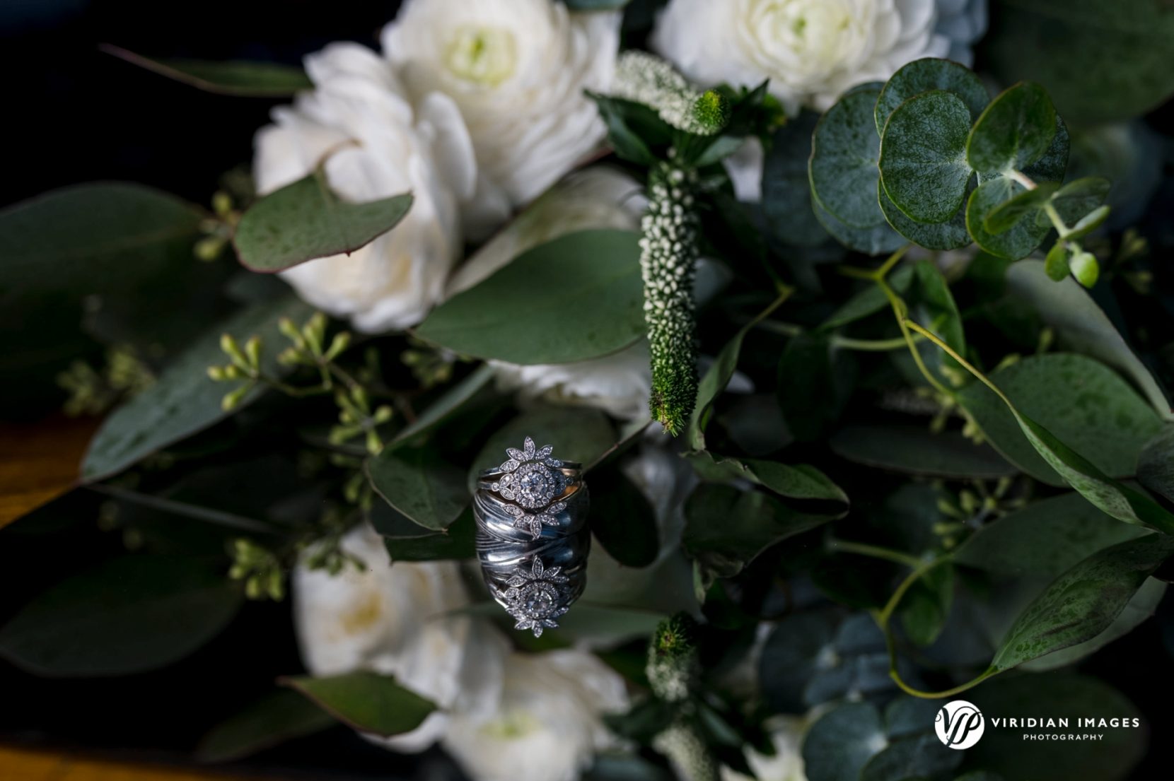 wedding ring detail with bride bouquet