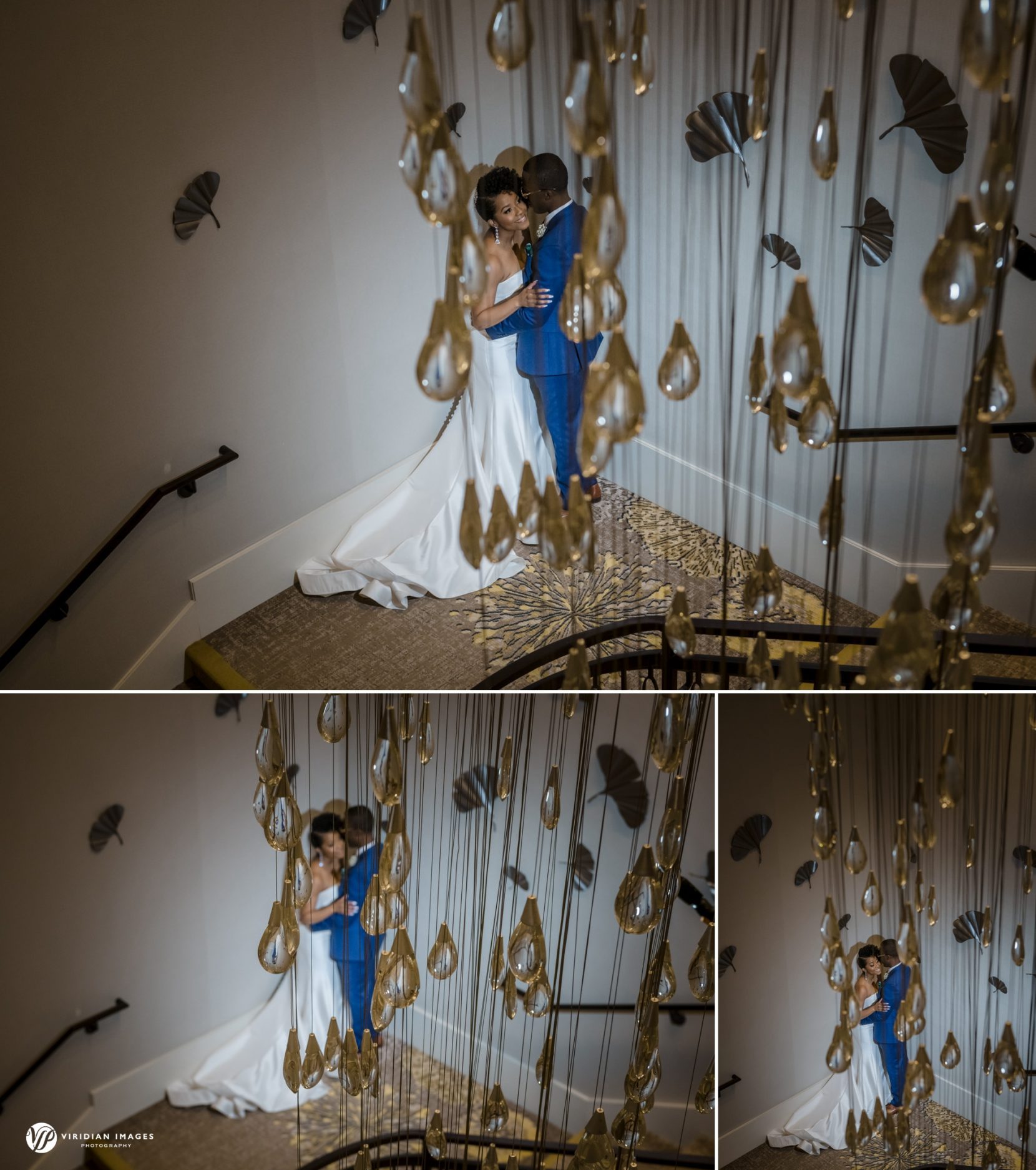 Couple portraits through cascading crystal chandelier at grand staircase Hyatt Regency Atlanta