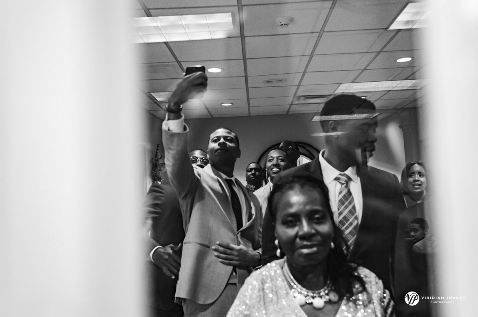 wedding party anticipation before ceremony begins at Kingdom Hall of Jehovah's Witnesses 