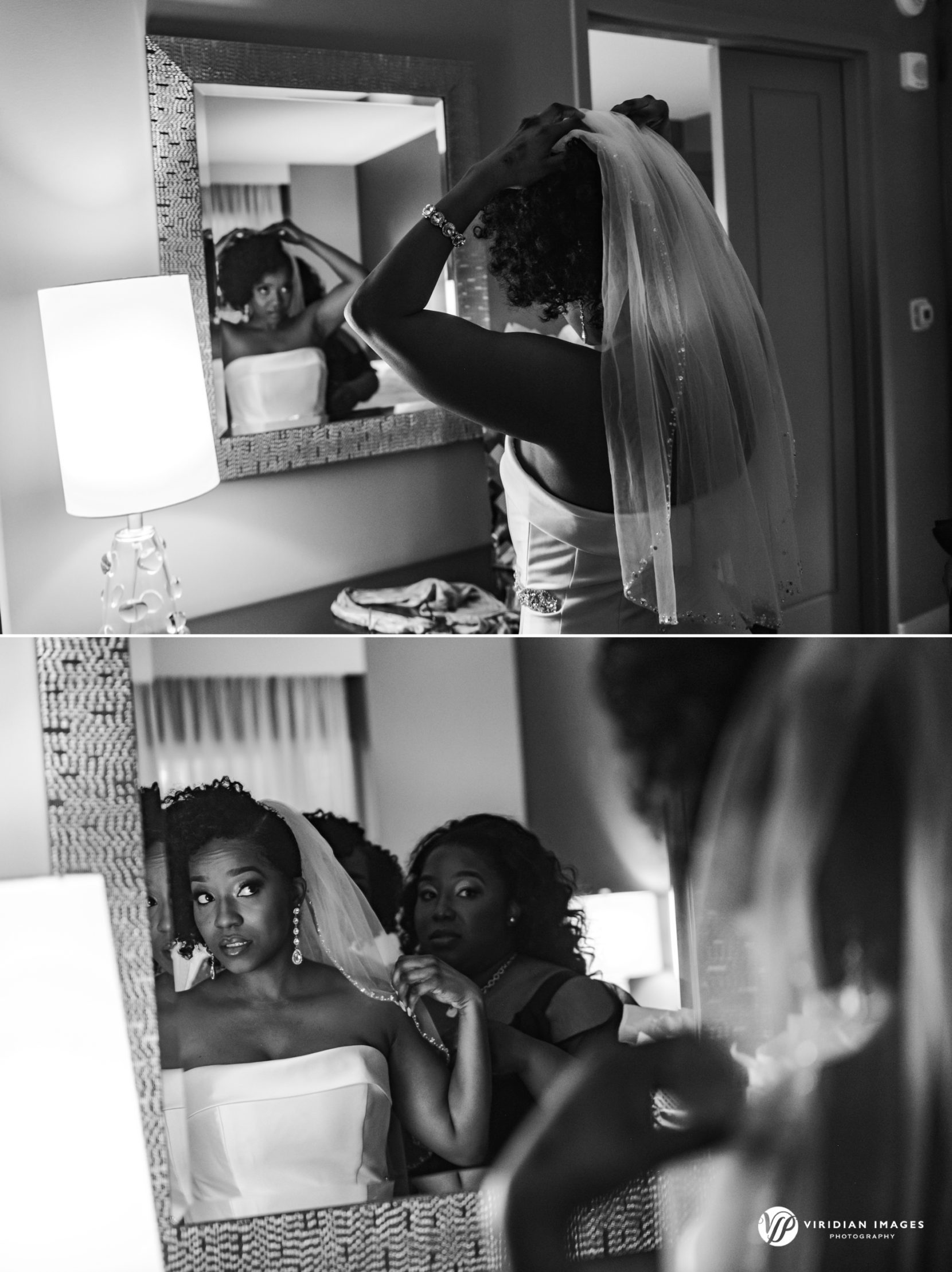 Bride looking at mirror adjusting veil at Hyatt Regency Atlanta Perimeter during wedding morning prep