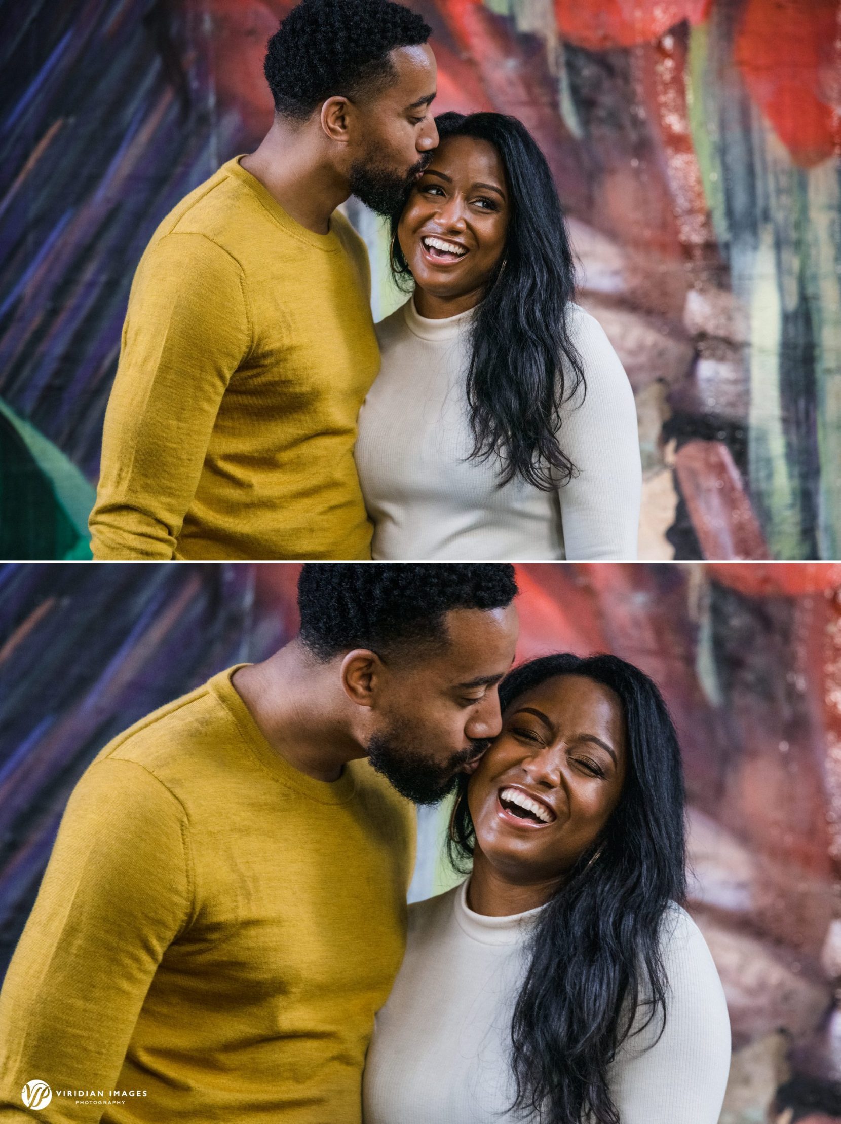 couple laughing in front of art mural during fall engagement session