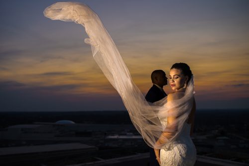 creative editorial style wedding portrait during sunset on rooftop helipad at Ventanas Atlanta