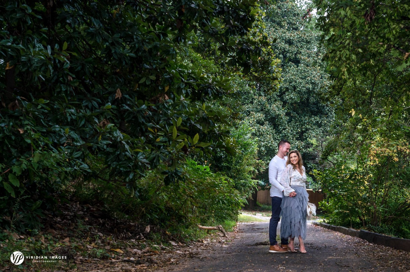 Romantic engagement portrait at Inman Park