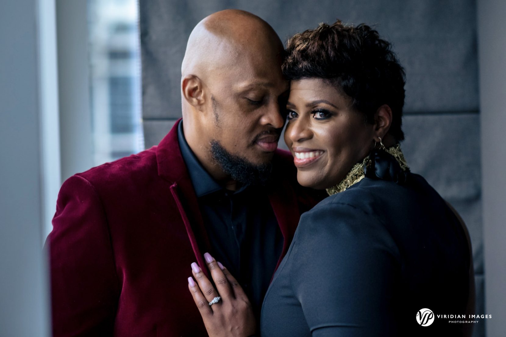 High-end engagement photos in an Atlanta luxury hotel setting