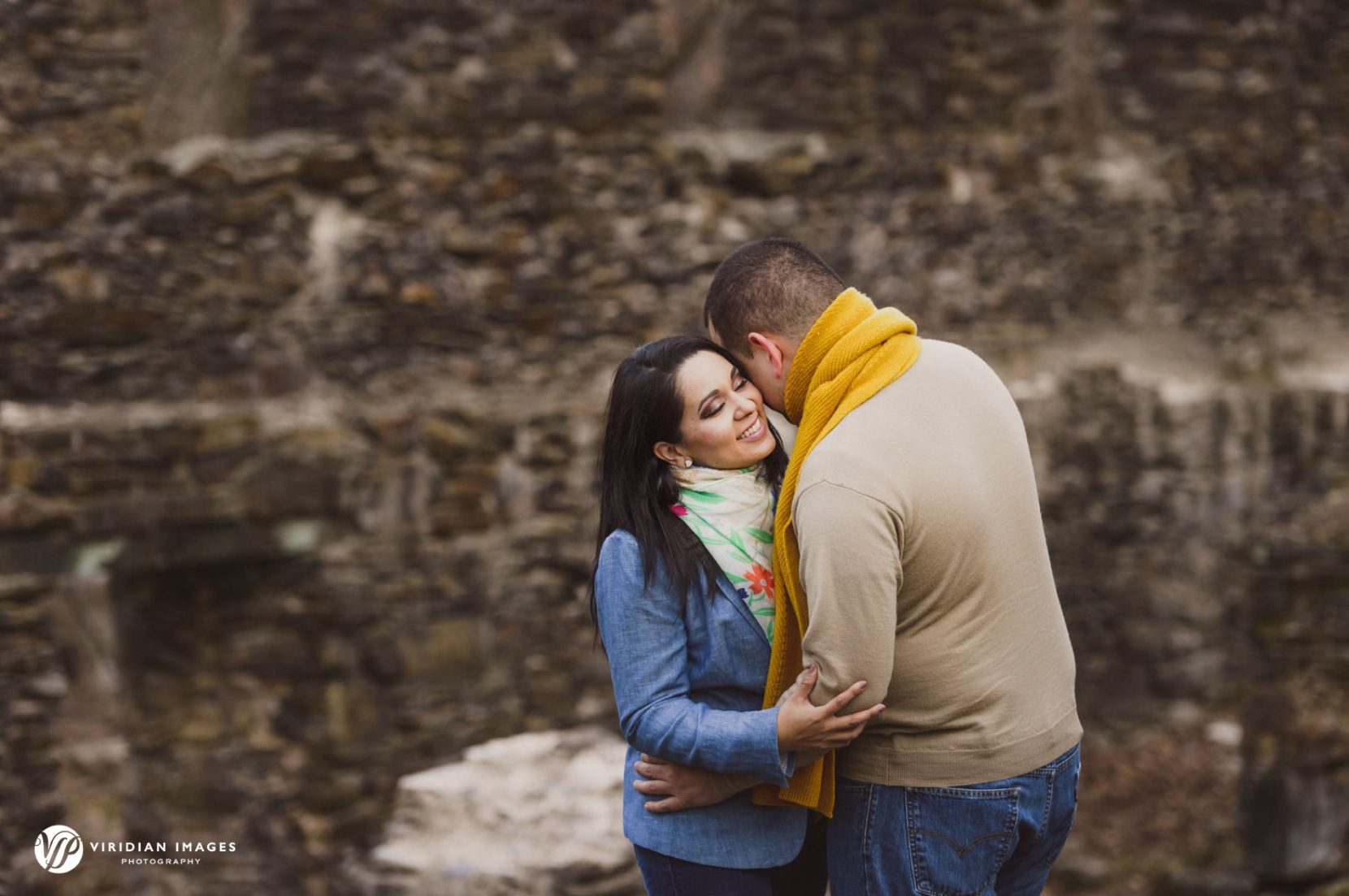Couple sharing a quiet moment during their engagement session at Sope Creek Trail