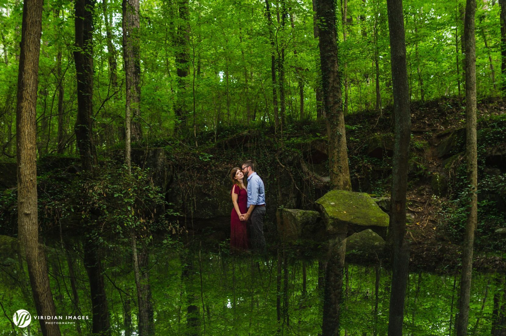 Creative reflection photo of engaged couple portrait at Cascade Springs Natural Preserve