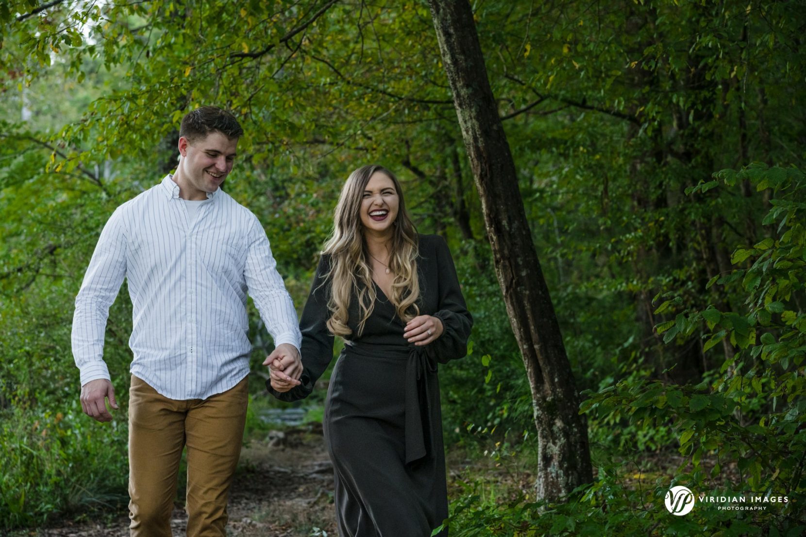 Couple enjoys walking together at Sweetwater Creek park in Atlanta