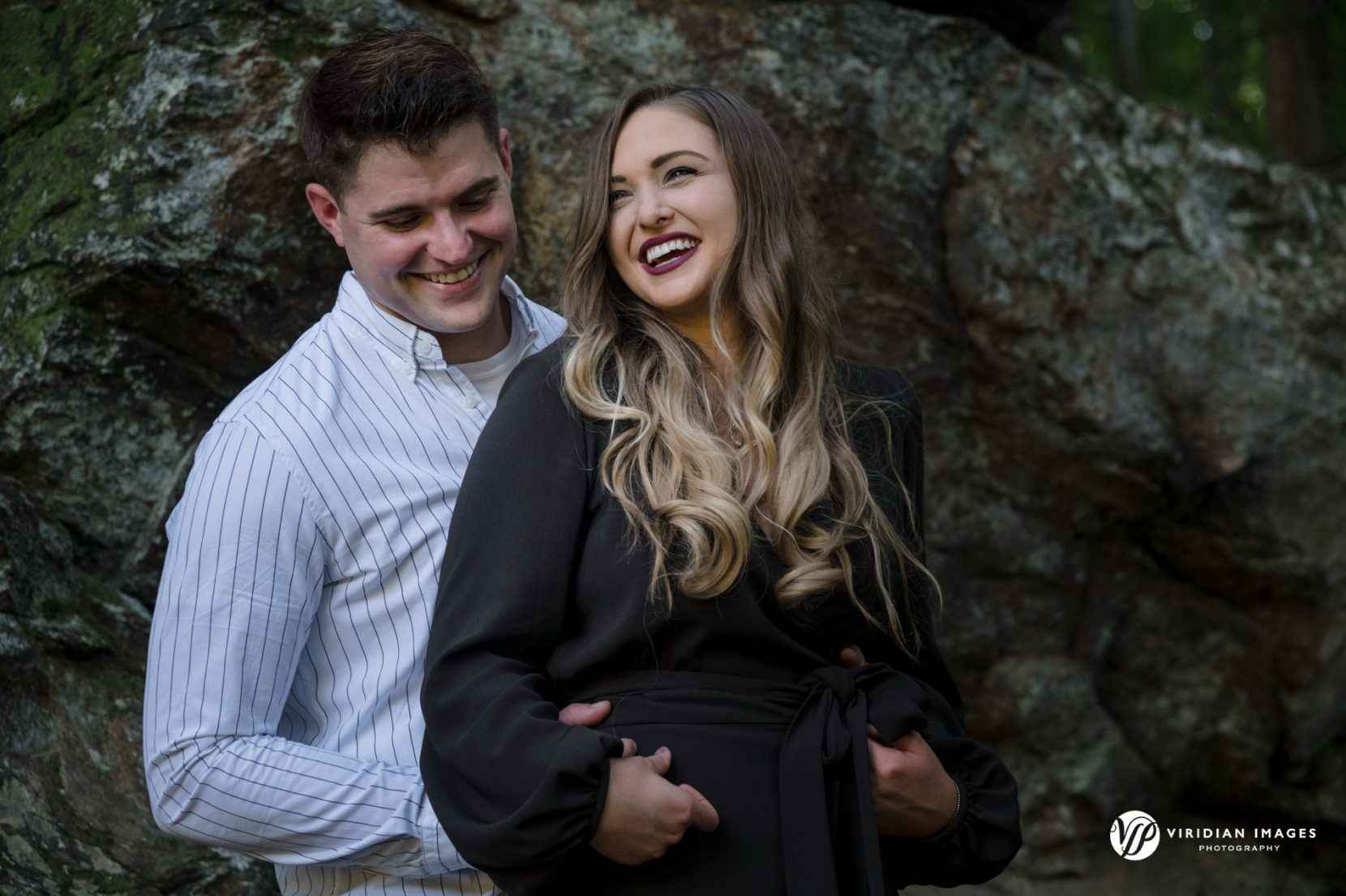 Couple laughing during engagement session with Viridian Images Photography
