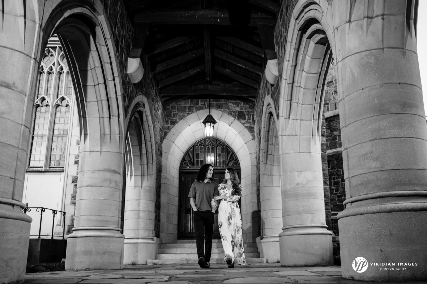 Candid couple walking on pathway during Berry College engagement session