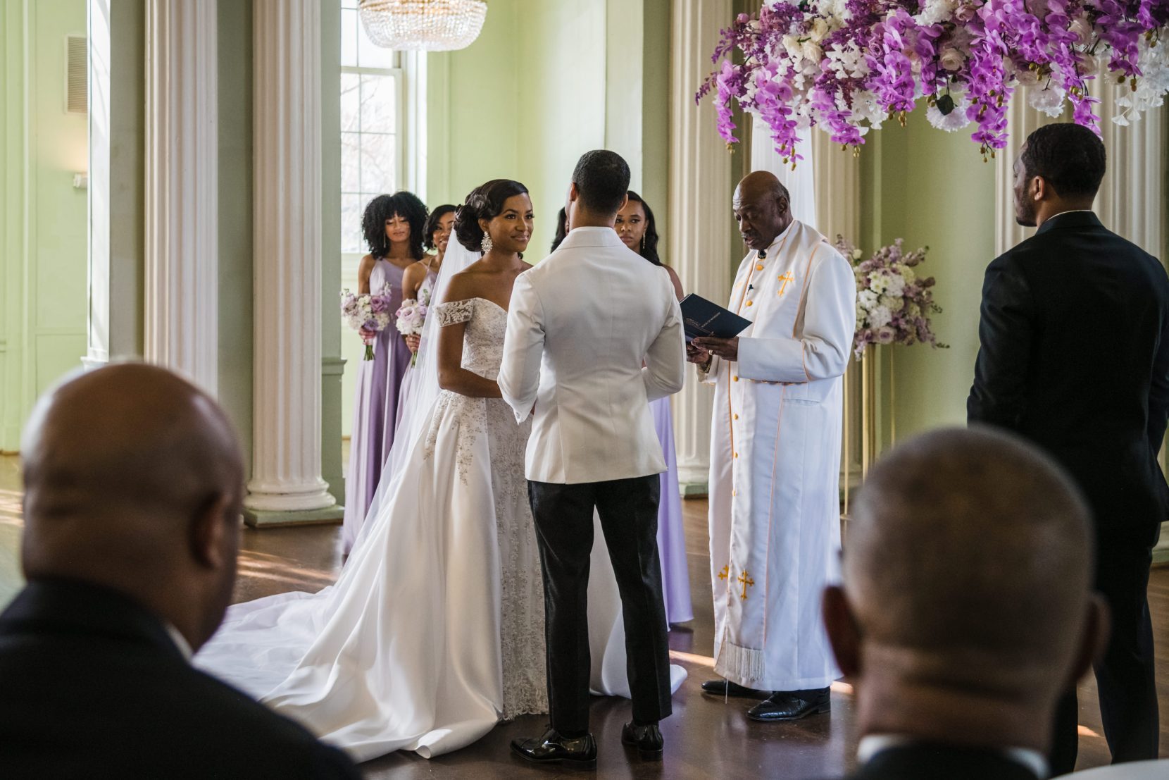 Emotional wedding ceremony between bride and groom indoors at Biltmore Ballrooms Atlanta