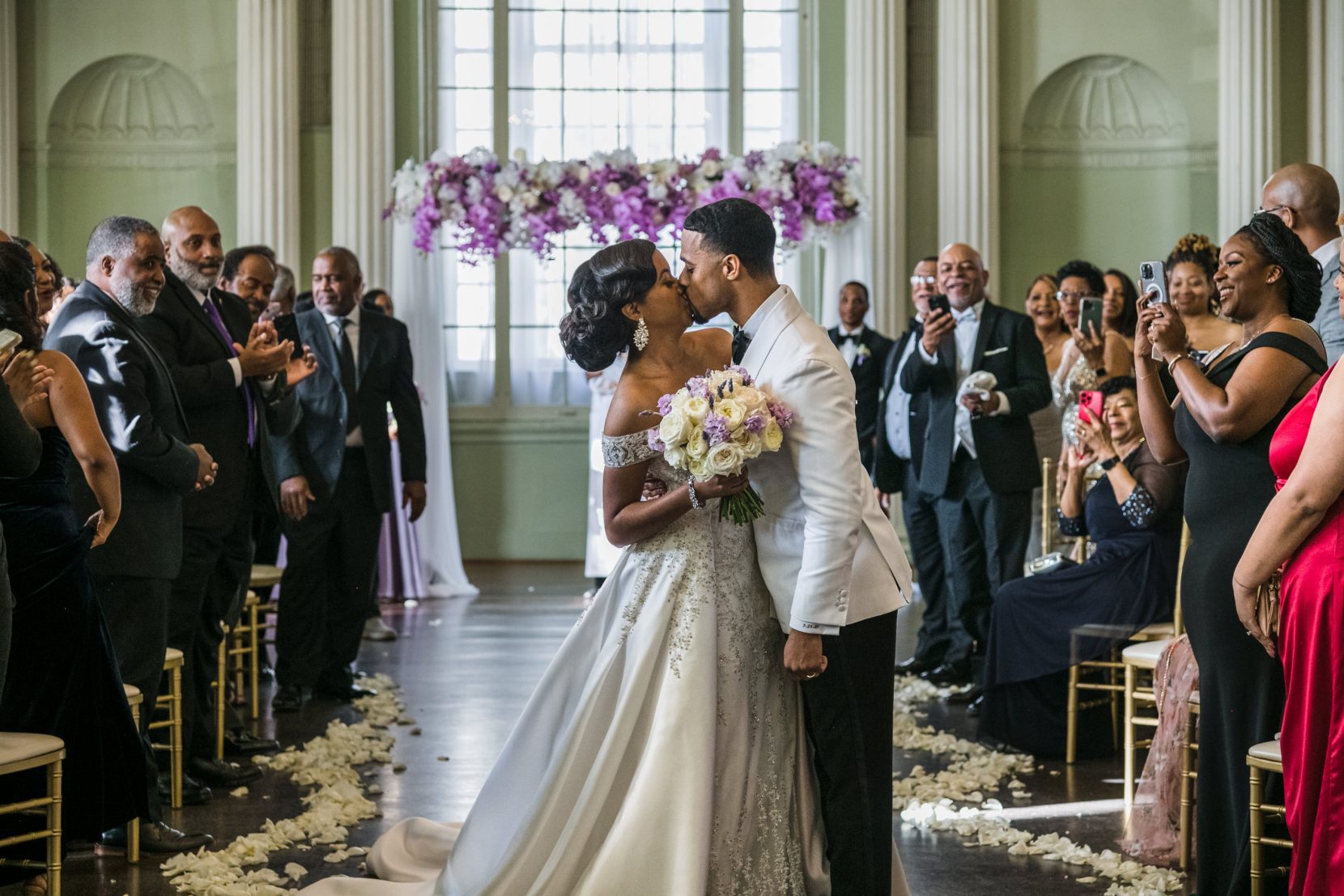 First kiss during wedding ceremony at Biltmore Ballrooms Atlanta