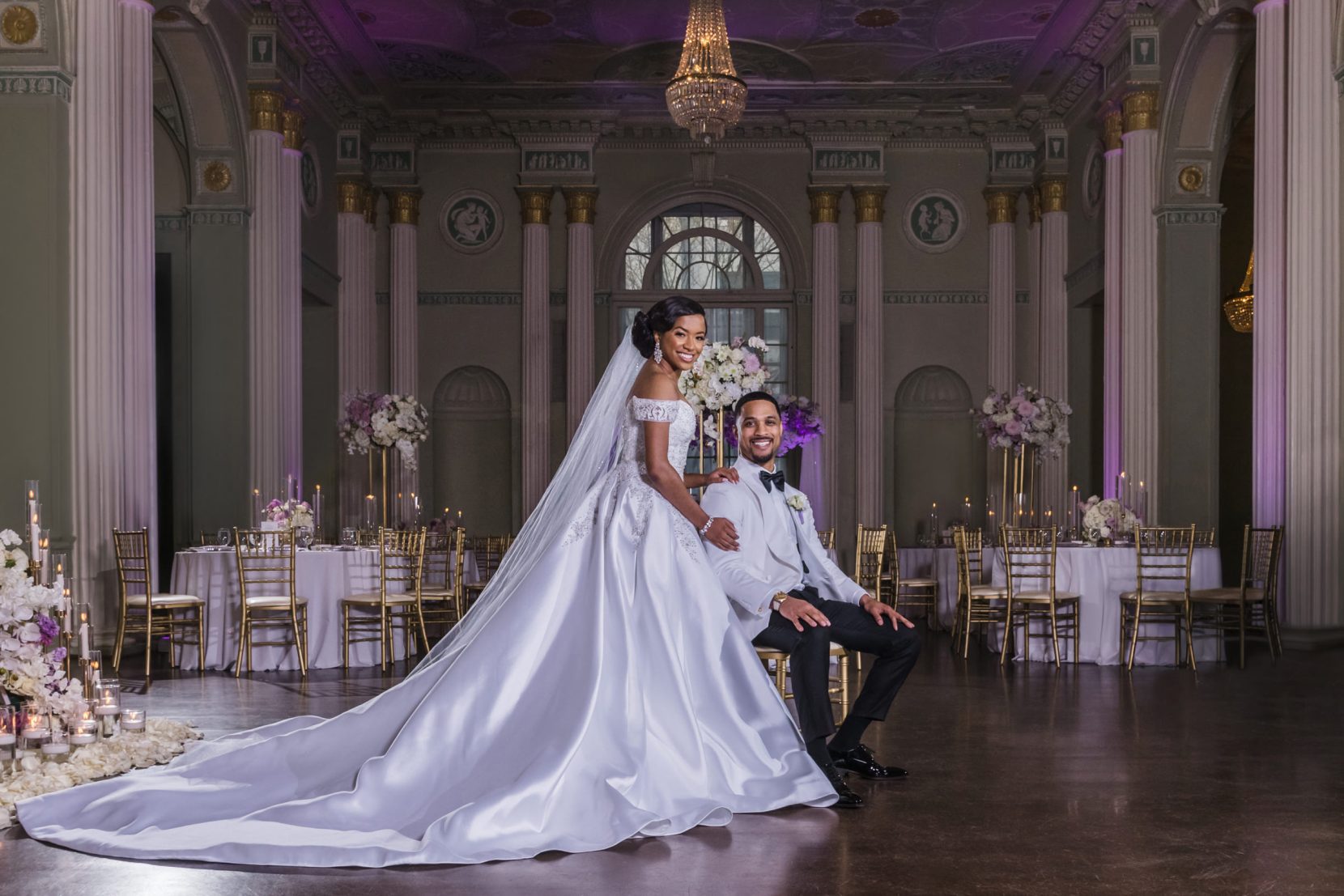 Bride and groom portrait inside Biltmore Ballrooms Atlanta with chandelier lighting