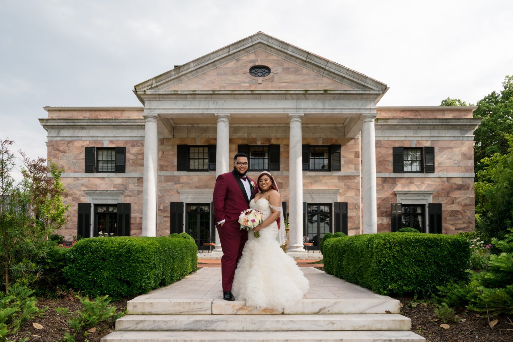 Tate House wedding couple portrait in front of marble mansion in North Georgia