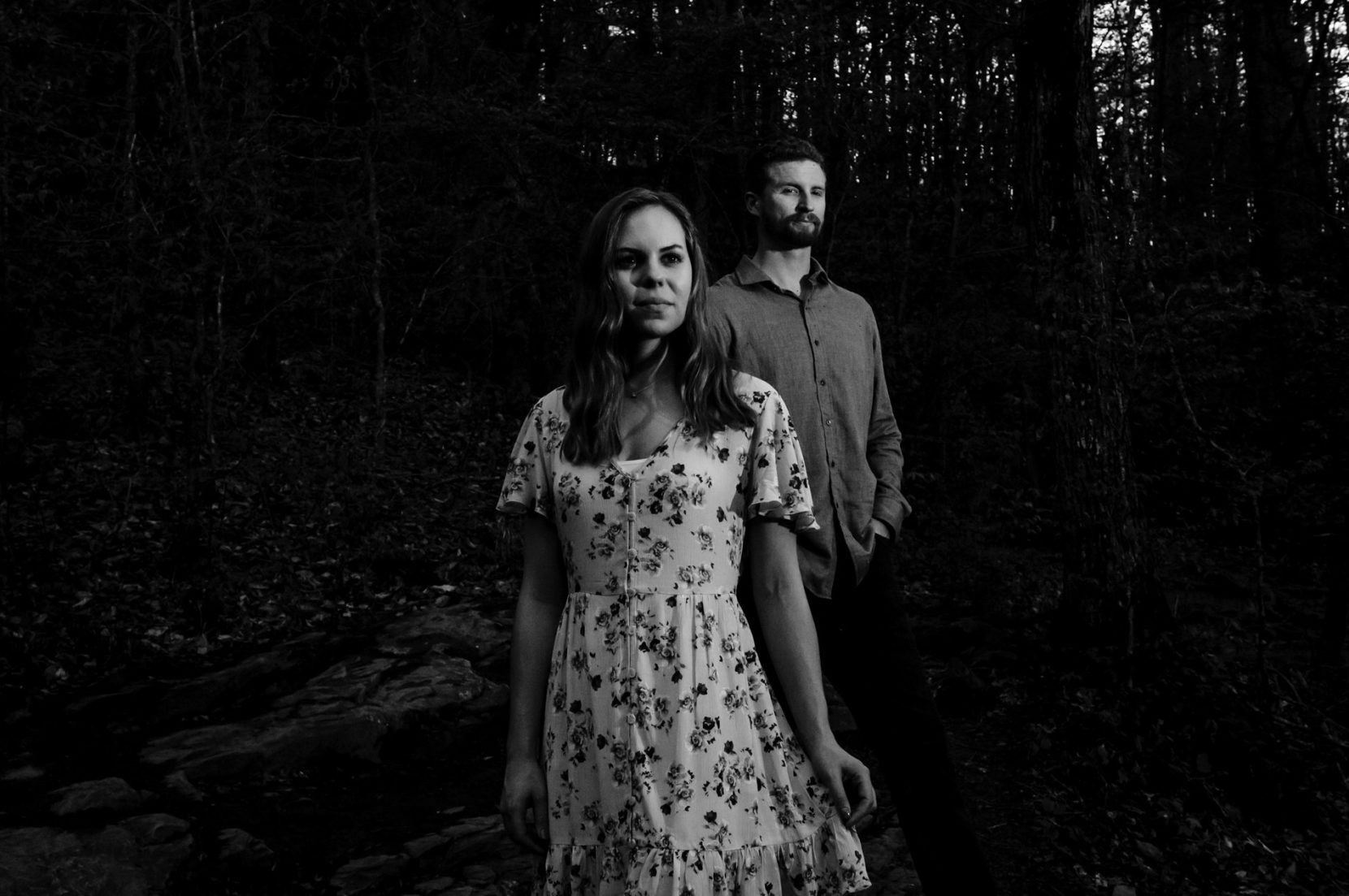 Editorial-style portrait during final moments of engagement session at Sweetwater Creek park