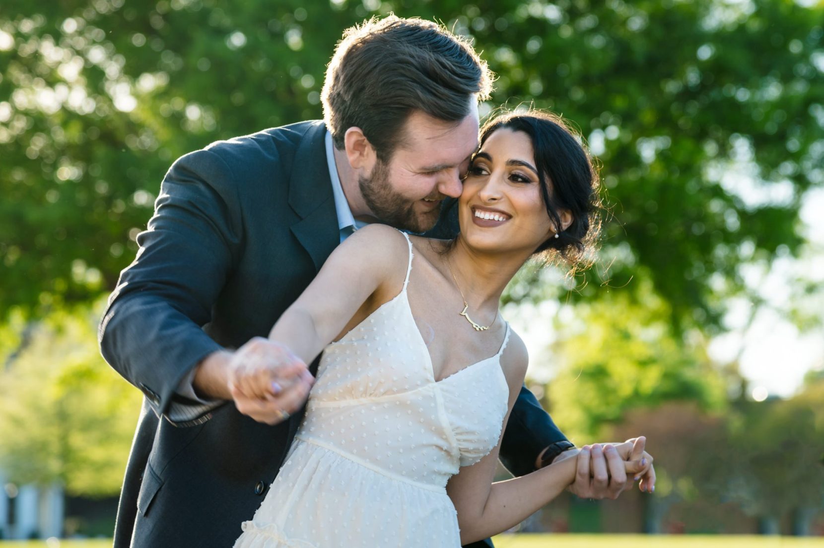 Couple connected during engagement session at a Norcross, Georgia park at sunset.