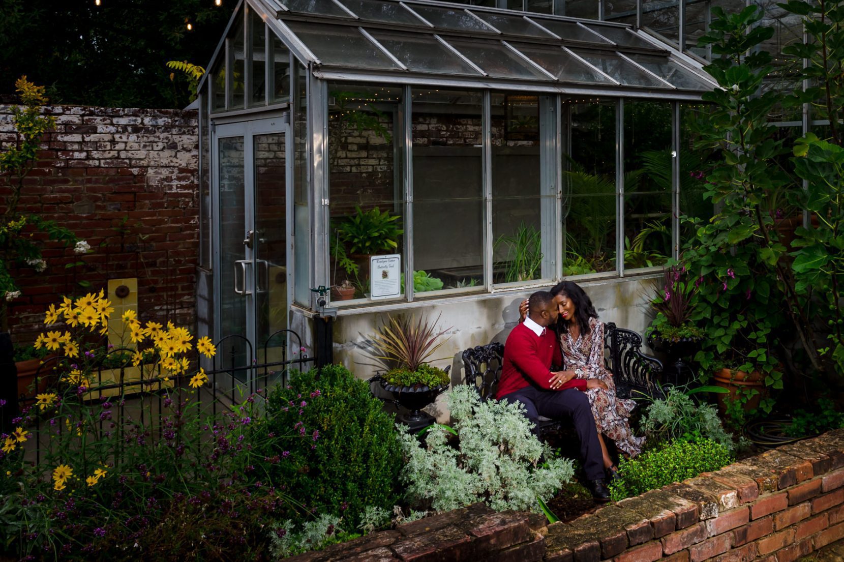 Couple sharing a quiet moment together in an outdoor estate setting