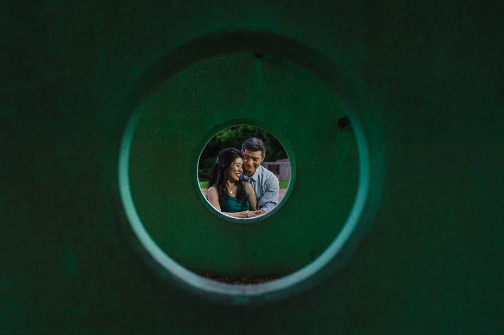 Create engagement session portrait at an Atlanta park playground